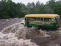 Автобус смыло с дороги рекой